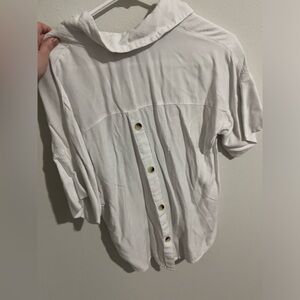 White buttoned in back shirt